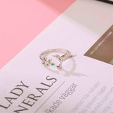Anello Camaleonte con brillanti verdi | Oro bianco
