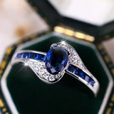 Anello flow in zaffiro | Oro bianco