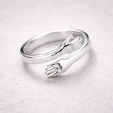 Anello regolabile in stile abbraccio | Oro bianco