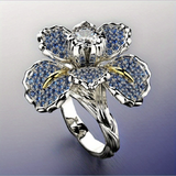Anello con fiori blu e cristallo | Oro bianco