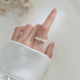 Anello a forma di margherita | Oro bianco