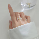 Anello a forma di margherita | Oro bianco