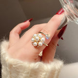 Anello regolabile con perle carine | Oro
