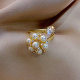 Anello regolabile con perle carine | Oro