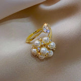 Anello regolabile con perle carine | Oro