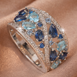 Anello retro con brillanti blu | Oro