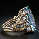 Anello retrò con file di brillanti blu | Oro