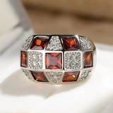 Anello vintage con pietre preziose rosse | Oro bianco