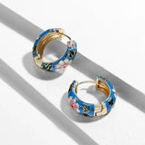 Bijoux fiori neri di lusso | Oro