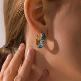Bijoux fiori neri di lusso | Oro