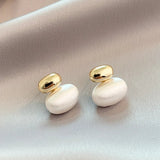 Orecchini con perla ovale | Oro