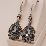 Orecchini eleganti in cristallo nero mandala | Oro