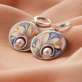 Orecchini in acrilico con perle | Oro
