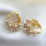 Orecchini dal design vintage con perle | Oro