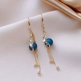 Orecchini festivi con margherite blu | Oro