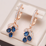 Orecchini pendenti con cristalli blu | Oro