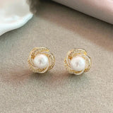 Orecchini pendenti con perle rotonde e brillanti | Oro