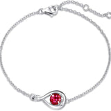 Bracciale infinito in rubini | Oro bianco