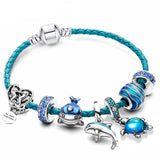 Bracciale oceano + pendenti in pelle e inclusi | Oro bianco