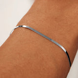 Bracciale sole serpente | Oro bianco