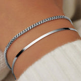 Bracciale sole serpente | Oro bianco