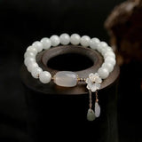 Bracciale con Acquamarina e Margherite | Oro