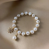 Bracciale con medaglione, margherita e girasole | Oro bianco