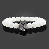 Bracciale con perle a forma di zampe, motivo in pietra naturale | Oro