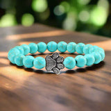 Bracciale con perle a forma di zampe, motivo in pietra naturale | Oro