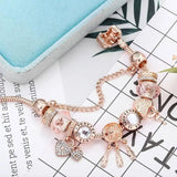 Bracciale sognatore rosa con pendenti | Oro bianco