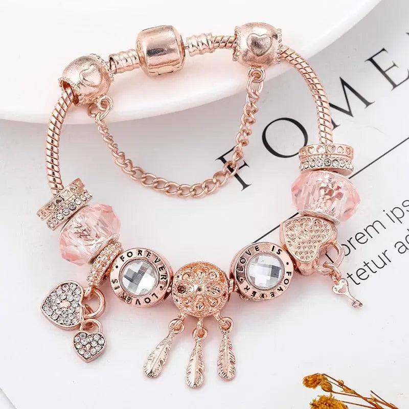 Bracciale catturafantasie rosa con pendenti | Oro bianco