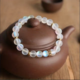 Bracciale di fiducia con margherite e pietra di luna | Oro
