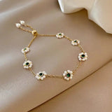 Bracciale elegante con cristalli verdi | Oro