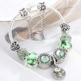 Bracciale e cristallo verde | Oro bianco