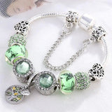 Bracciale e cristallo verde | Oro bianco