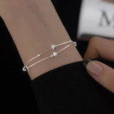 Braccialetto con stelle | Oro bianco