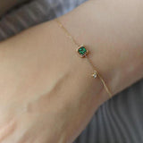 Bracciale con cristallo verde | Oro