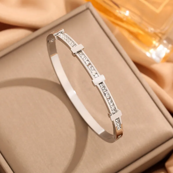 Bracciale geometrico aperto con due file di brillanti | Oro