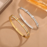 Bracciale geometrico aperto con due file di brillanti | Oro