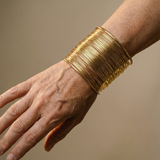 Bracciale aperto con spirale | Oro