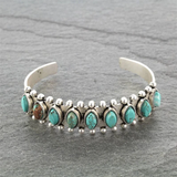 Bracciale rétro con pietre turchesi | Oro