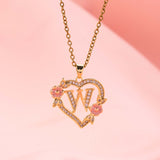 Collana iniziale con charm floreale | Oro