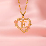 Collana iniziale con charm floreale | Oro