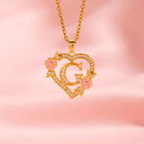 Collana iniziale con charm floreale | Oro