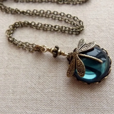 Collana retro libellula cristallo verde | Oro