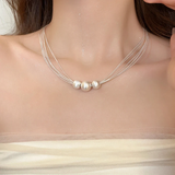 Collana con strati di perle bianche | Oro