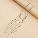 Collana con pendenti e pietre brillanti a forma di goccia | Oro bianco