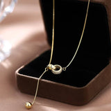 Collana con due anelli | Oro