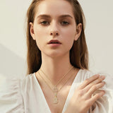Collana con lettera iniziale in pavé | Oro