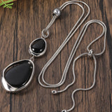 Collana con pendente retrò e pietra nera | Oro
